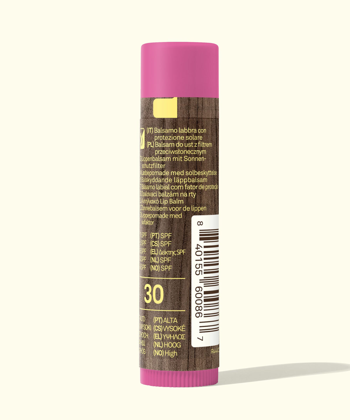 Lip balm with pink cap and brown label on a white background