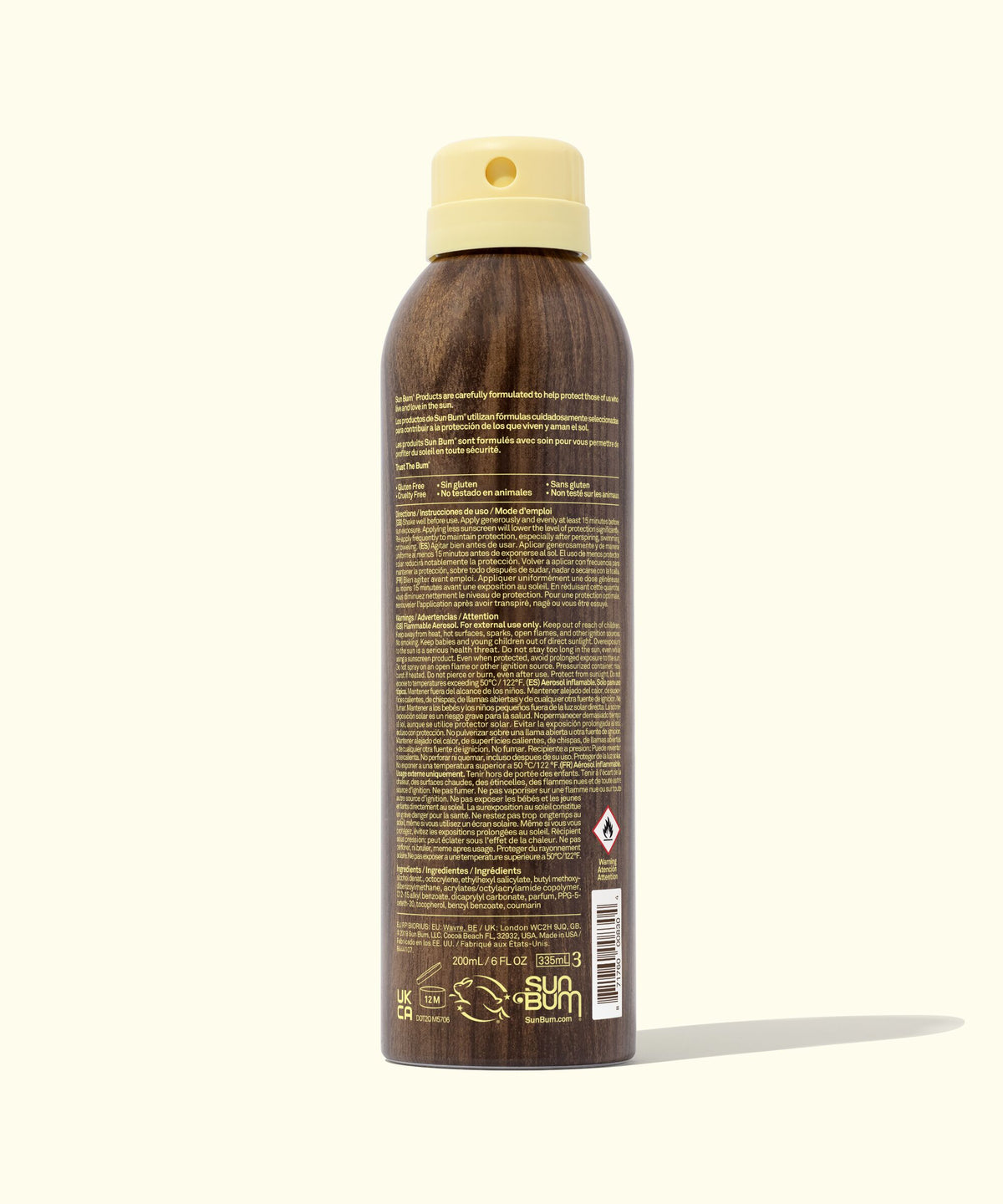 Sunscreen spray bottle with visible branding on a white background