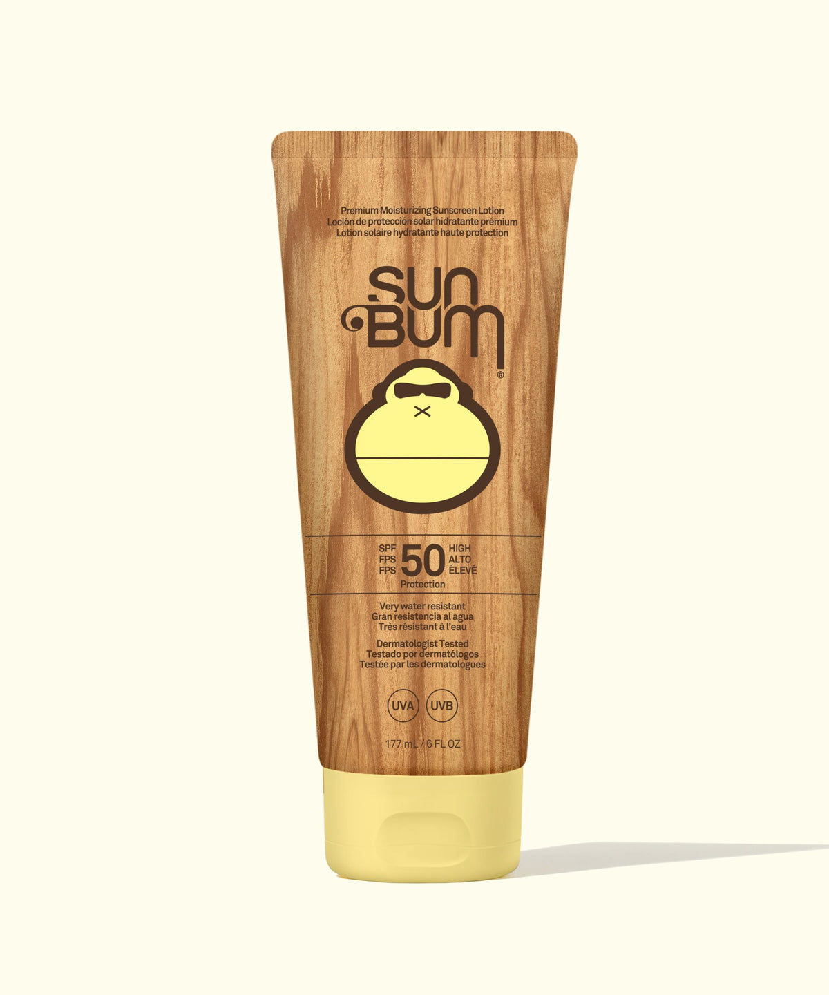 Sun Bum sunscreen tube with wooden design on a white background